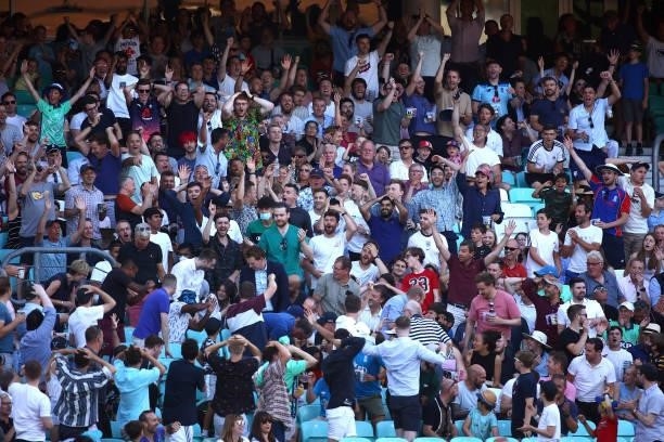 Spectators enjoy the atmosphere during The Hundred match between Oval Invincibles Men and Manchester Originals Men at The Kia Oval on July 22, 2021...