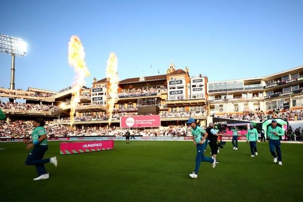 The Oval Invincibles team run out to field during The Hundred match between Oval Invincibles Men and Manchester Originals Men at The Kia Oval on July...