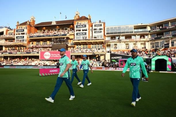 The Oval Invincibles team run out to field during The Hundred match between Oval Invincibles Men and Manchester Originals Men at The Kia Oval on July...