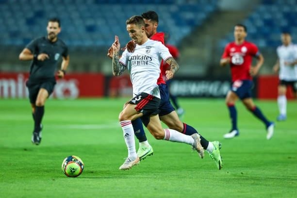 Alex Grimaldo of SL Benfica tries to escape Zeki Celik of LOSC Lille during the Pre-Season Friendly match between SL Benfica and Lille at Estadio...