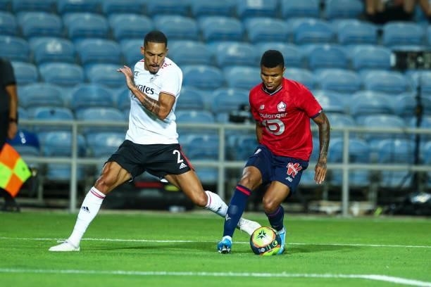 Gilberto of SL Benfica vies with Tiago Djalo of LOSC Lille during the Pre-Season Friendly match between SL Benfica and Lille at Estadio Algarve on...
