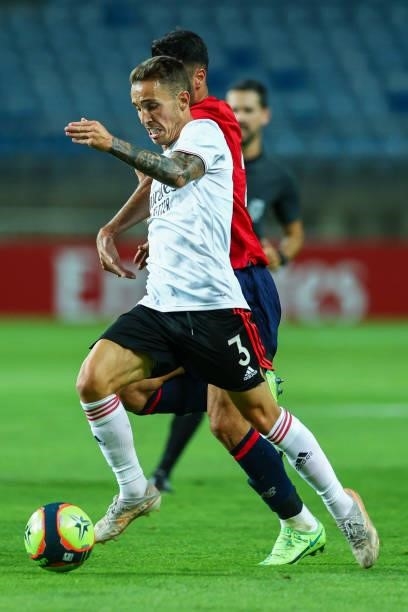 Alex Grimaldo of SL Benfica tries to escape Zeki Celik of LOSC Lille during the Pre-Season Friendly match between SL Benfica and Lille at Estadio...