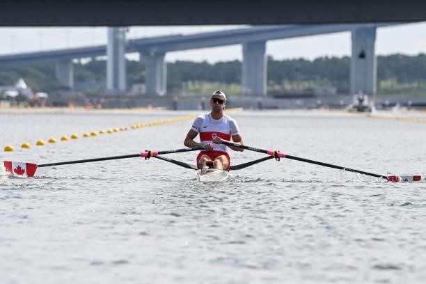 Canada's Trevor Jones competes in the men's single sculls rowing heats during the Tokyo 2020 Olympic Games at the Sea Forest Waterway in Tokyo on...