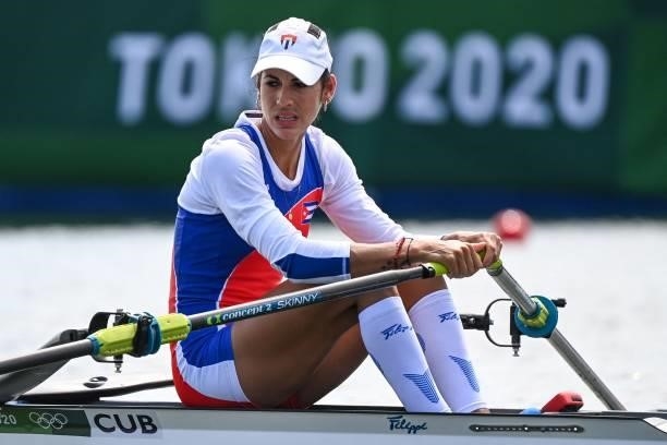 Cuba's Milena Venega Cancio competes in the women's single sculls rowing heats during the Tokyo 2020 Olympic Games at the Sea Forest Waterway in...