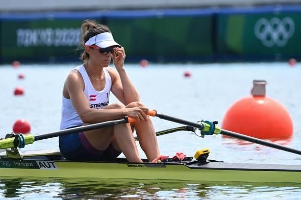 Austria's Magdalena Lobnig competes in the women's single sculls rowing heats during the Tokyo 2020 Olympic Games at the Sea Forest Waterway in Tokyo...