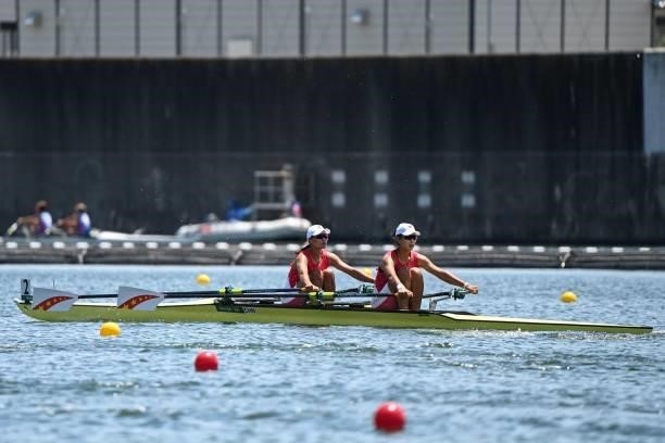 China's Shen Shuangmei and China's Liu Xiaoxin compete in the women's double sculls rowing heats during the Tokyo 2020 Olympic Games at the Sea...
