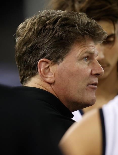 Robert Harvey, Interim Senior Coach of the Magpies addresses his players during the 2021 AFL Round 19 match between the Port Adelaide Power and the...