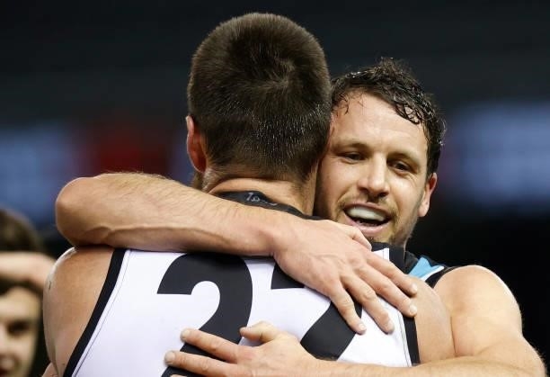 Charlie Dixon and Travis Boak of the Power celebrate during the 2021 AFL Round 19 match between the Port Adelaide Power and the Collingwood Magpies...