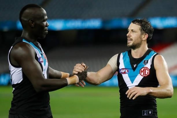 Aliir Aliir and Travis Boak of the Power celebrate during the 2021 AFL Round 19 match between the Port Adelaide Power and the Collingwood Magpies at...