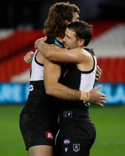 Scott Lycett and Travis Boak of the Power celebrate during the 2021 AFL Round 19 match between the Port Adelaide Power and the Collingwood Magpies at...