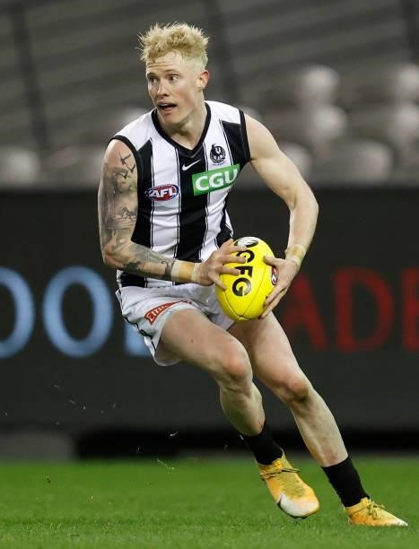 John Noble of the Magpies in action during the 2021 AFL Round 19 match between the Port Adelaide Power and the Collingwood Magpies at Marvel Stadium...