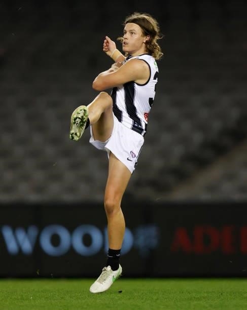 Debutant, Jack Ginnivan of the Magpies kicks the ball during the 2021 AFL Round 19 match between the Port Adelaide Power and the Collingwood Magpies...
