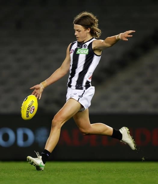 Debutant, Jack Ginnivan of the Magpies kicks the ball during the 2021 AFL Round 19 match between the Port Adelaide Power and the Collingwood Magpies...