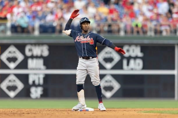 Ozzie Albies of the Atlanta Braves reacts after hitting a double in the top of the third inning against the Philadelphia Phillies at Citizens Bank...