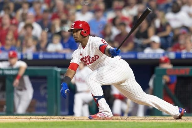 Jean Segura of the Philadelphia Phillies hits an RBI double in the bottom of the fourth inning against the Atlanta Braves at Citizens Bank Park on...