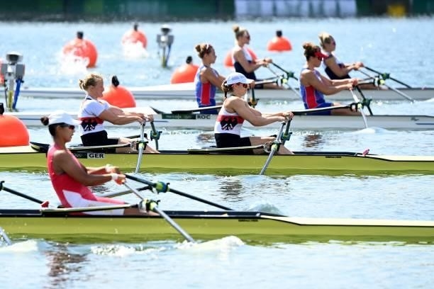 Athletes compete in the women's double sculls repechage during the Tokyo 2020 Olympic Games at the Sea Forest Waterway in Tokyo on July 24, 2021.