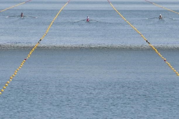 Athletes compete in the lightweight women's double sculls heats during the Tokyo 2020 Olympic Games at the Sea Forest Waterway in Tokyo on July 24,...