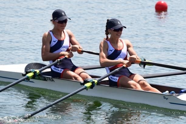 France's Laura Tarantola and France's Claire Bove compete in the lightweight women's double sculls heats during the Tokyo 2020 Olympic Games at the...