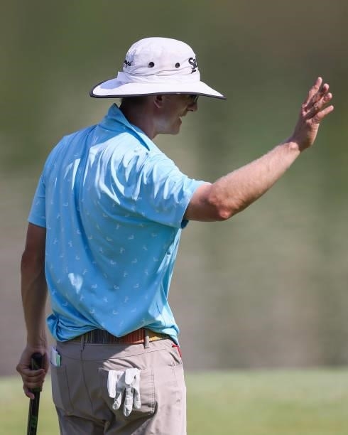 Mark Baldwin acknowledges the crowd on the 9th hole during the second round of the Price Cutter Charity Championship presented by Dr. Pepper at...