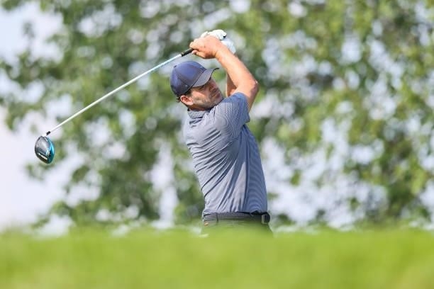 Tony Romo, former NFL quarterback, plays his shot from the 11th tee during the second round of the Price Cutter Charity Championship presented by Dr....