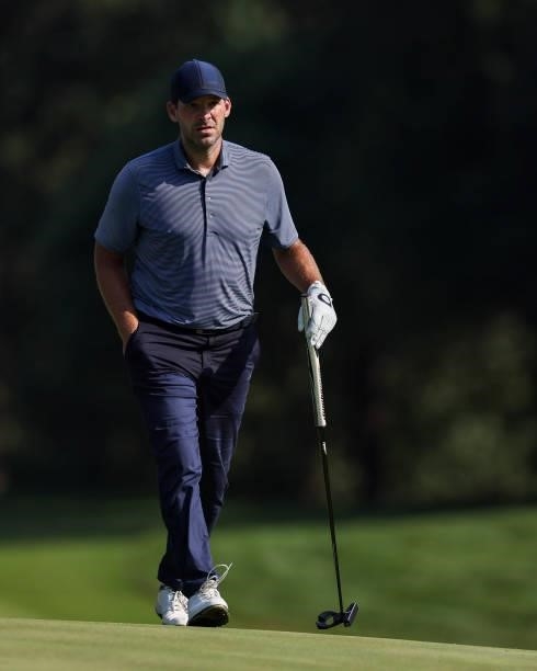 Tony Romo, former NFL quarterback, looks on from the 10th hole during the second round of the Price Cutter Charity Championship presented by Dr....