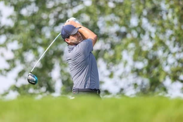 Tony Romo, former NFL quarterback, plays his shot from the 11th tee during the second round of the Price Cutter Charity Championship presented by Dr....