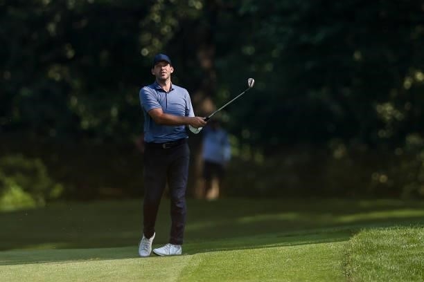 Tony Romo, former NFL quarterback, plays his shot from the 10th hole during the second round of the Price Cutter Charity Championship presented by...