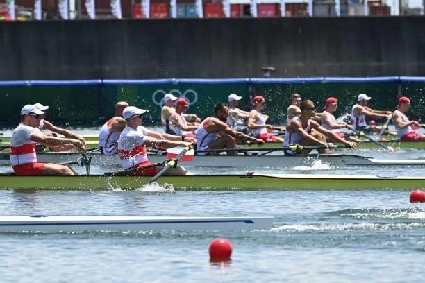 Athletes compete in the men's four heats during the Tokyo 2020 Olympic Games at the Sea Forest Waterway in Tokyo on July 24, 2021.