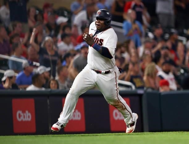 Miguel Sano of the Minnesota Twins scores a run in the eighth inning against the Los Angeles Angels at Target Field on July 23, 2021 in Minneapolis,...