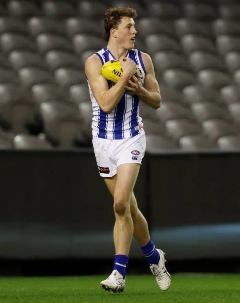 Nick Larkey of the Kangaroos in action during the 2021 AFL Round 19 match between the Carlton Blues and the North Melbourne Kangaroos at Marvel...
