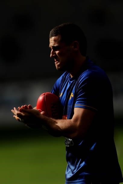 Jake Waterman of the Eagles warms up before the 2021 AFL Round 19 match between the West Coast Eagles and the St Kilda Saints at Optus Stadium on...