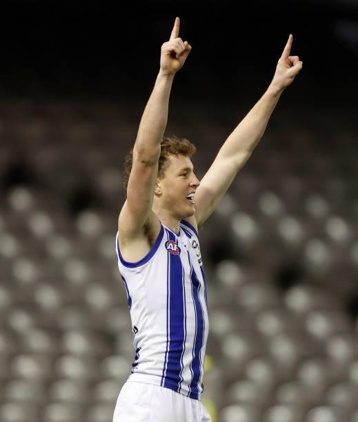Nick Larkey of the Kangaroos celebrates during the 2021 AFL Round 19 match between the Carlton Blues and the North Melbourne Kangaroos at Marvel...