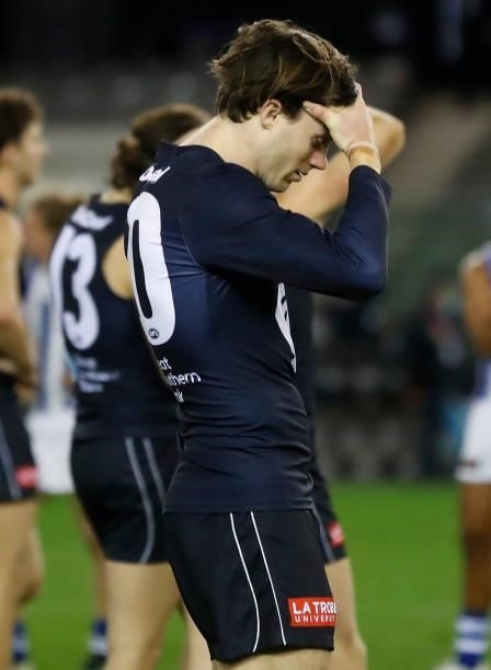 Lachie Plowman of the Blues looks dejected after a loss during the 2021 AFL Round 19 match between the Carlton Blues and the North Melbourne...
