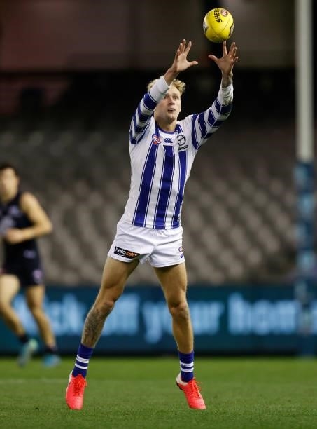 Jaidyn Stephenson of the Kangaroos in action during the 2021 AFL Round 19 match between the Carlton Blues and the North Melbourne Kangaroos at Marvel...