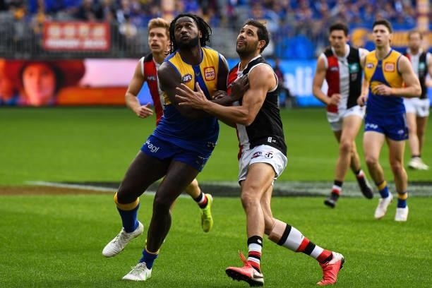 Nic Naitanui of the Eagles competes a throw-in with Paddy Ryder of the Saints during the 2021 AFL Round 19 match between the West Coast Eagles and...