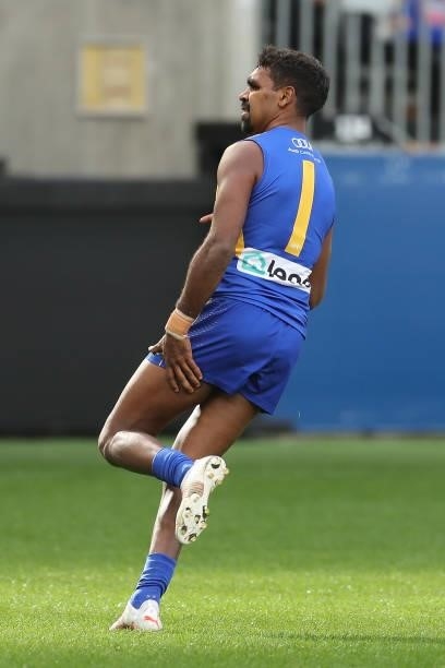 Liam Ryan of the Eagles grabs his left hamstring after scoring a goal during the 2021 AFL Round 19 match between the West Coast Eagles and the St...