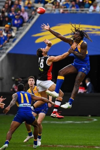 Paddy Ryder of the Saints competes in a ruck contest with Nic Naitanui of the Eagles during the 2021 AFL Round 19 match between the West Coast Eagles...