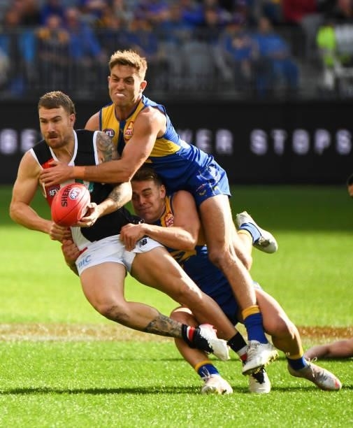 Tim Membrey of the Saints is tackled by Brad Sheppard of the Eagles during the 2021 AFL Round 19 match between the West Coast Eagles and the St Kilda...