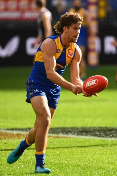 Connor West of the Eagles handpasses the ball during the 2021 AFL Round 19 match between the West Coast Eagles and the St Kilda Saints at Optus...
