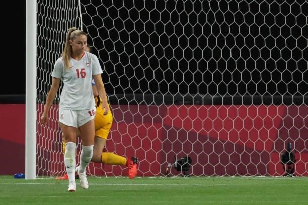 Canada's forward Janine Beckie reacts after failing to score a penalty shot during the Tokyo 2020 Olympic Games women's group E first round football...