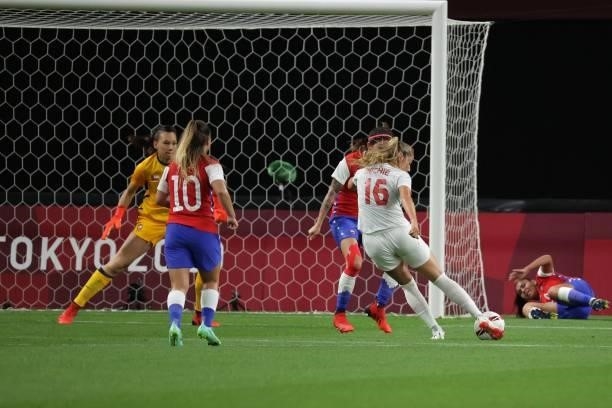 Canada's forward Janine Beckie shoots to score her team's first gaol during the Tokyo 2020 Olympic Games women's group E first round football match...