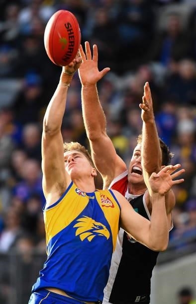 Harry Edwards of the Eagles spoils in a marking contest during the 2021 AFL Round 19 match between the West Coast Eagles and the St Kilda Saints at...