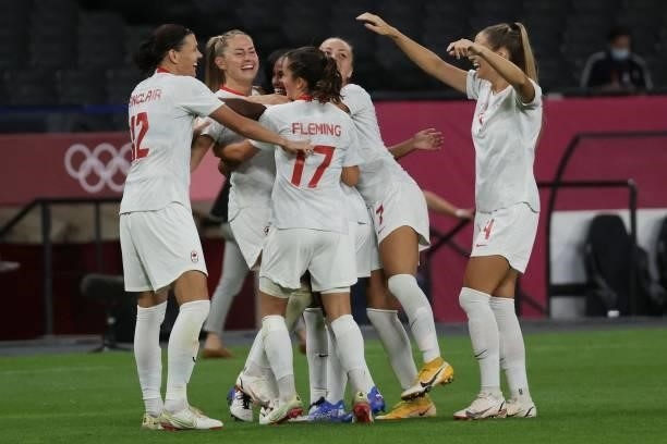 Cananda players celebrate their team's second goal during the Tokyo 2020 Olympic Games women's group E first round football match between Chile and...