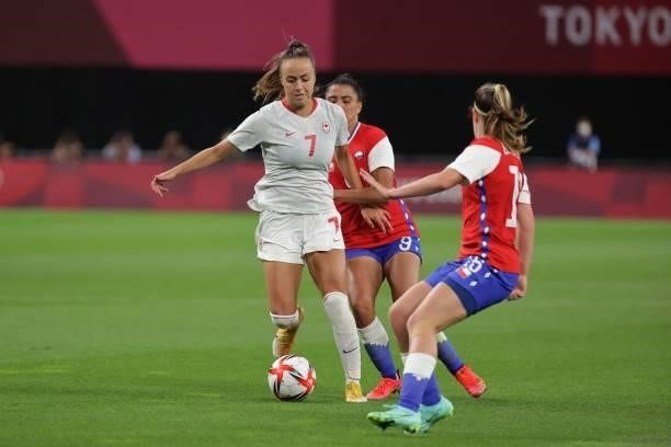 Canada's midfielder Julia Grosso controls the ball during the Tokyo 2020 Olympic Games women's group E first round football match between Chile and...