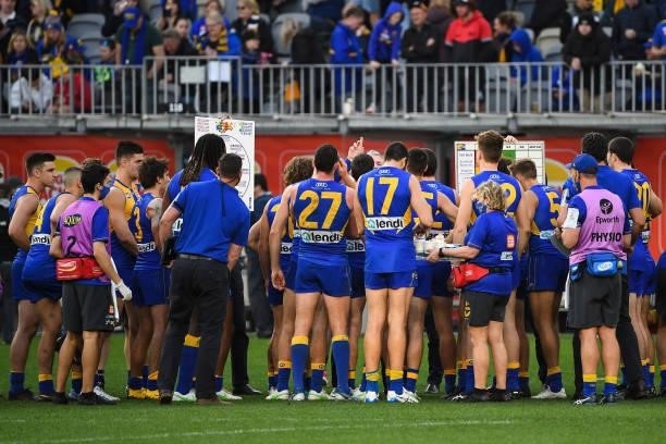 The West Coast Eagles huddle at three quarter time during the 2021 AFL Round 19 match between the West Coast Eagles and the St Kilda Saints at Optus...