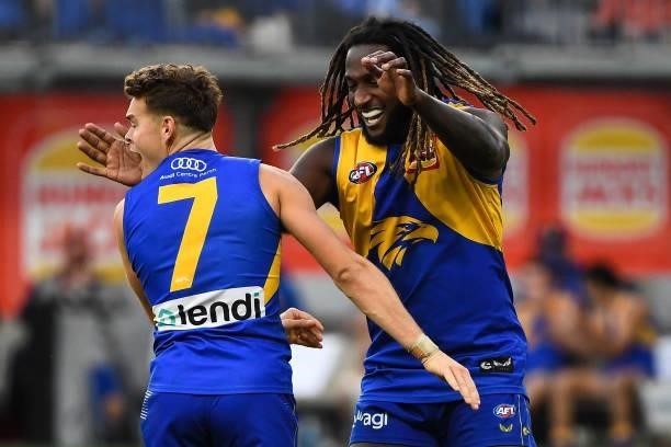 Nic Naitanui and Zac Langdon of the Eagles celebrate a goal during the 2021 AFL Round 19 match between the West Coast Eagles and the St Kilda Saints...