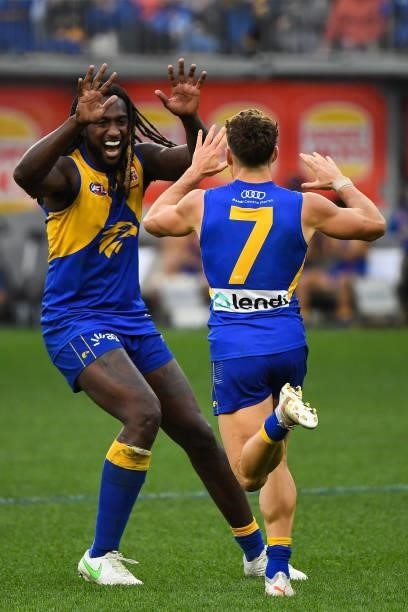 Nic Naitanui and Zac Langdon of the Eagles celebrate a goal during the 2021 AFL Round 19 match between the West Coast Eagles and the St Kilda Saints...