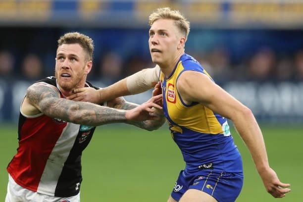 Dean Kent of the Saints contests a ruck with Oscar Allen of the Eagles during the 2021 AFL Round 19 match between the West Coast Eagles and the St...