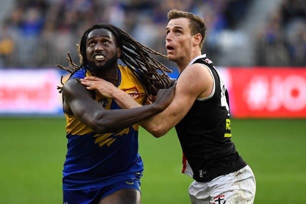 Nic Naitanui of the Eagles competes a throw-in with Paul Hunter of the Saints during the 2021 AFL Round 19 match between the West Coast Eagles and...