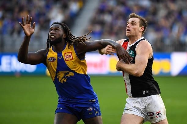 Nic Naitanui of the Eagles competes a throw-in with Paul Hunter of the Saints during the 2021 AFL Round 19 match between the West Coast Eagles and...